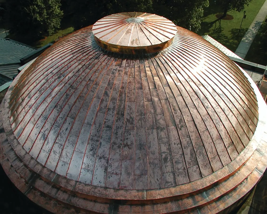 Craftsman Roofing crew installing a new roof in Peterstown